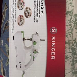 Singer White and Green Handheld Sewing Machine